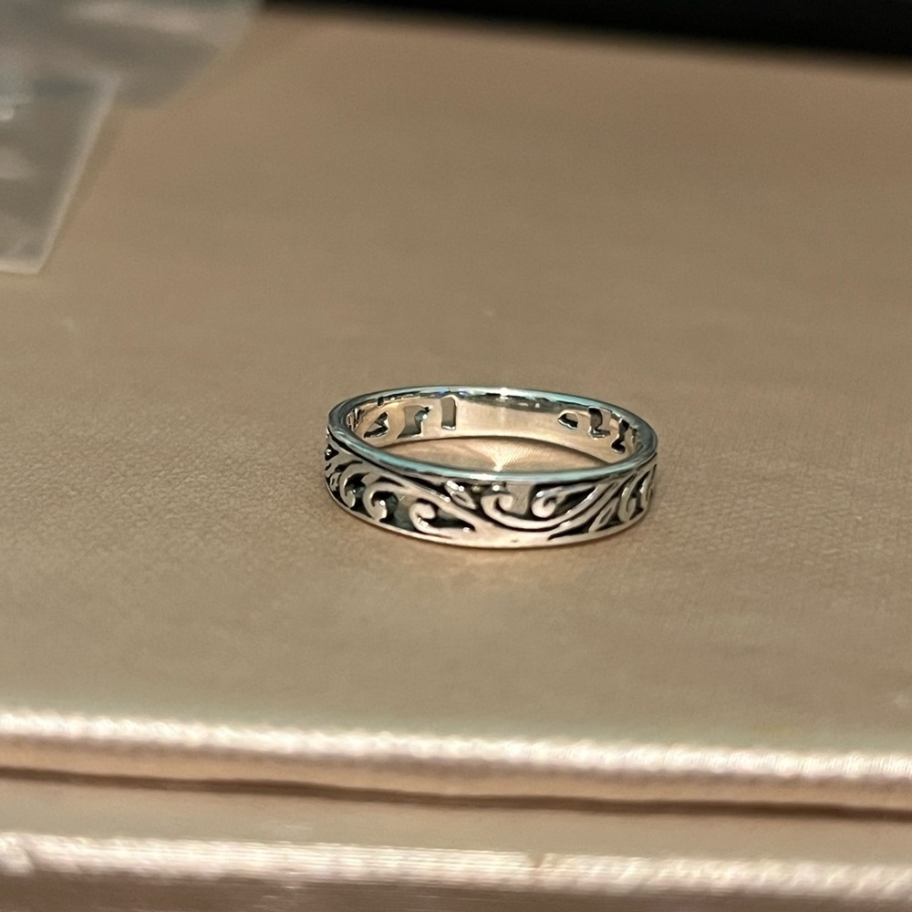 Silver oxidized swirl band ring